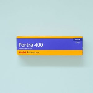 Kodak Portra 400 35mm Film 5 Pack Box on teal background