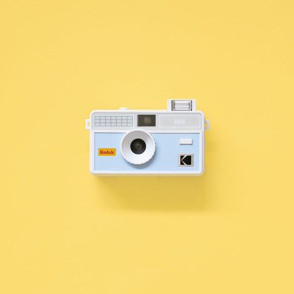 Kodak i60 Film Camera Blue Front Flash Kodak i60 35mm Film Camera Blue Flash up on yellow background