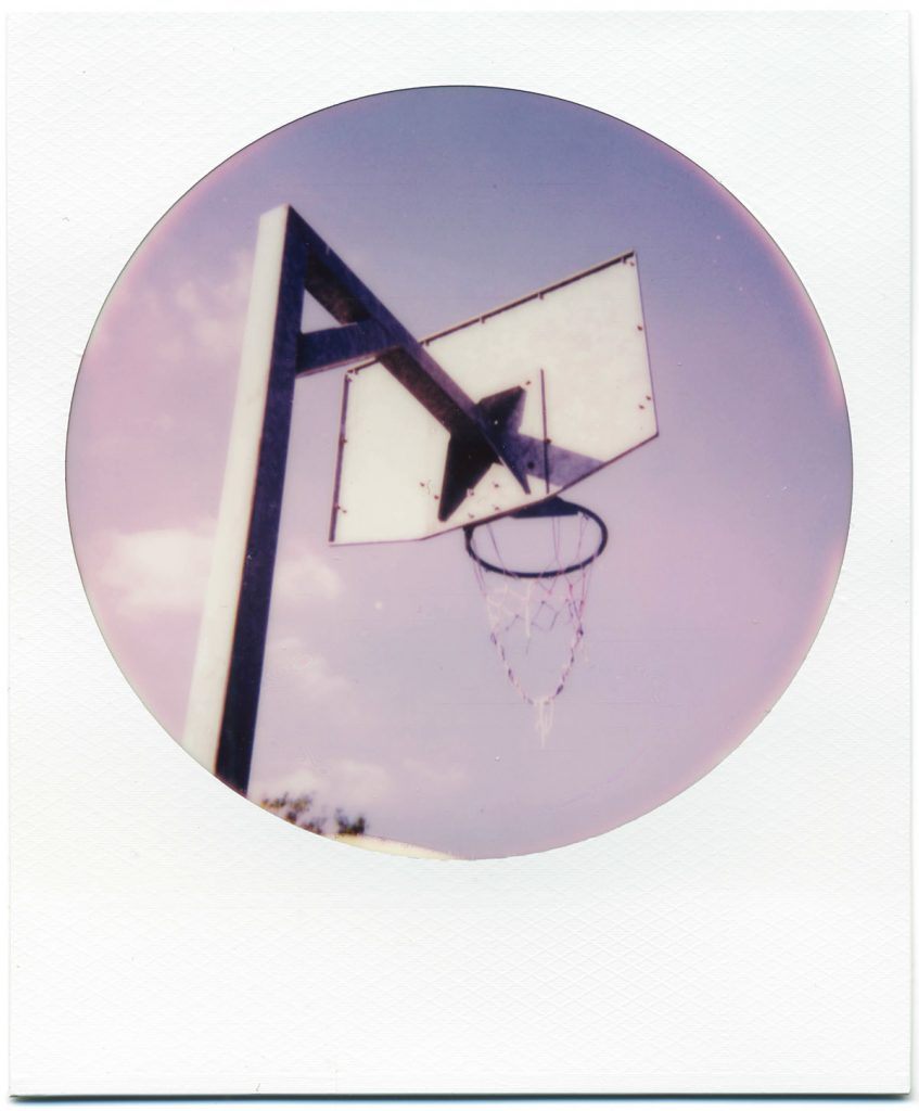 Basket ball hoop shot on Polaroid 600 Round Frame Film Review.