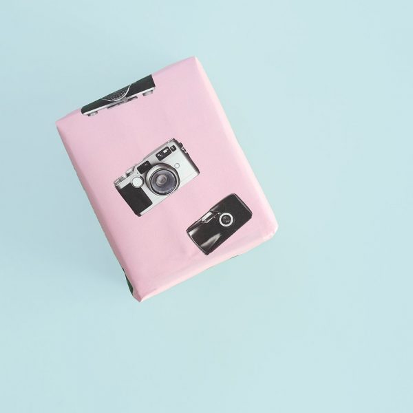 Parallax Wrapping Paper 1 Parallax Wrapping Paper Gift on teal background