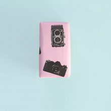 Parallax Wrapping Paper 2 Parallax Wrapping Paper Gift on teal background