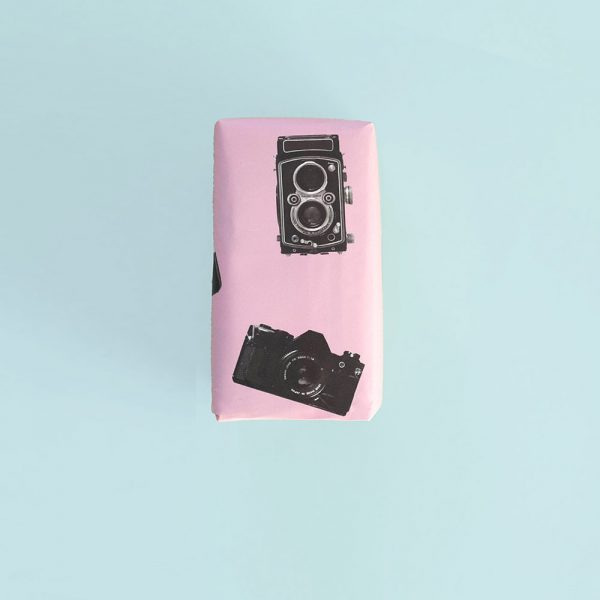 Parallax Wrapping Paper 2 Parallax Wrapping Paper Gift on teal background