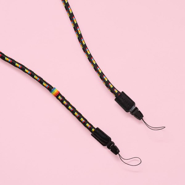 Polaroid Camera Strap Round Rainbow on pink background