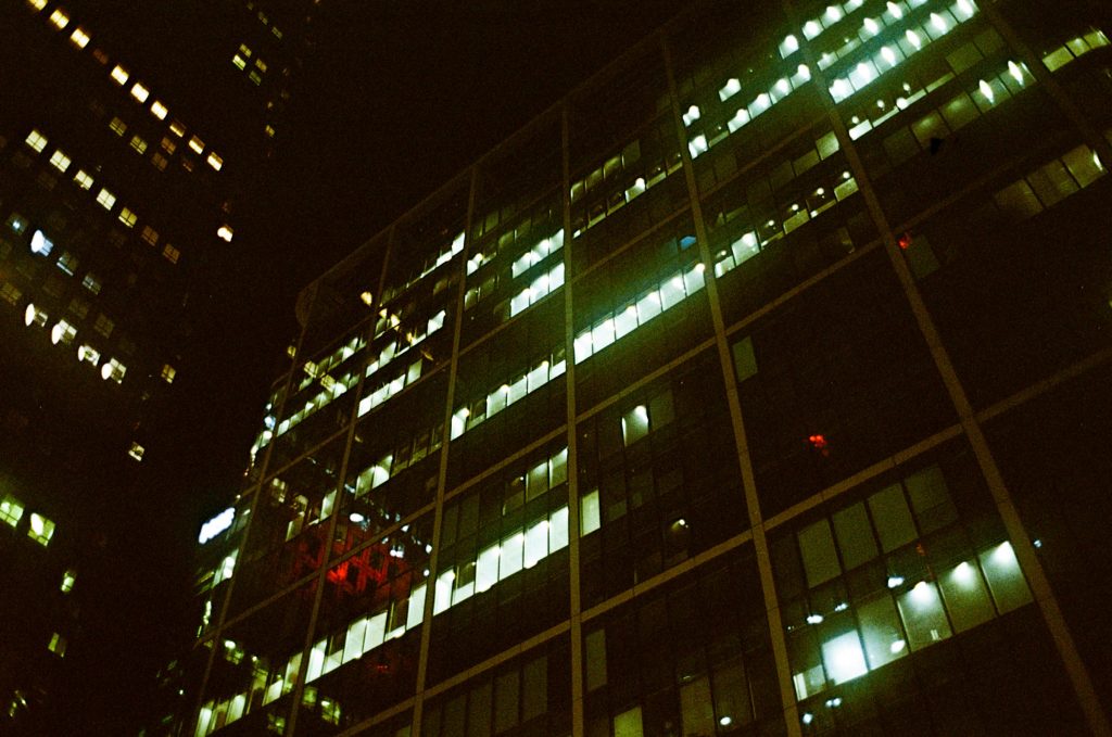 Kodak Ultramax pushed two stops. Canary Wharf buildings at night