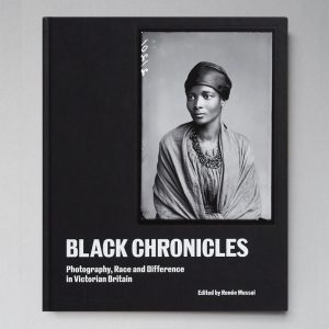 Black Chronicles photography book on a grey background
