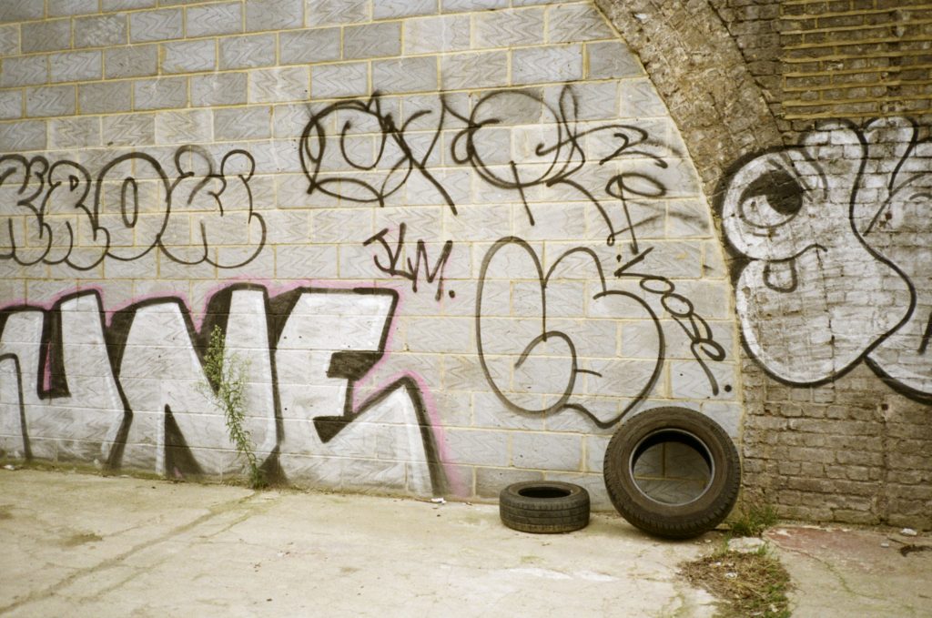 Grafitti and tires 35mm Film Kodak Colorplus