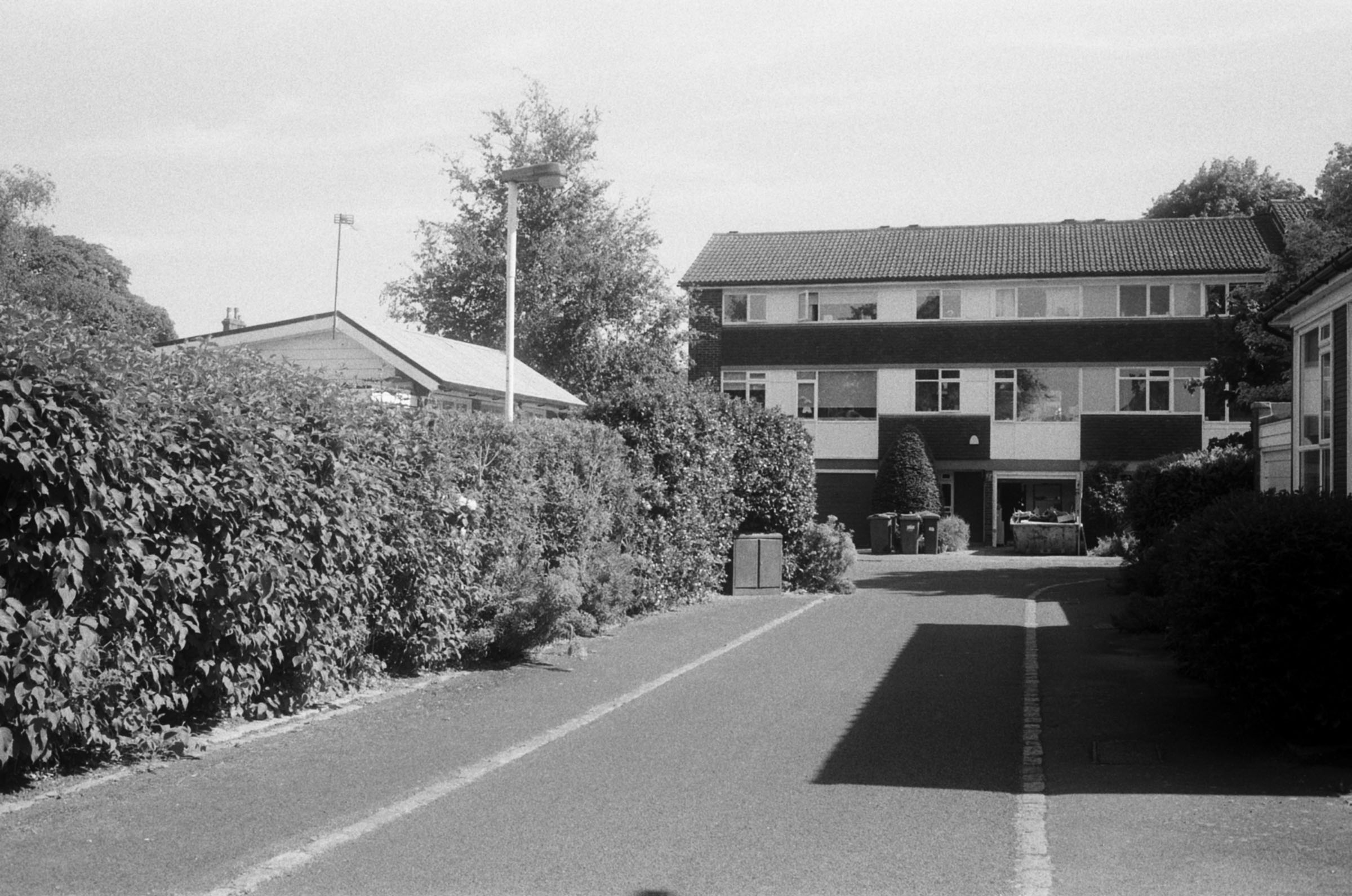 Mid Century Housing estate driveway and houses.
