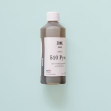 Zone Imaging Pyro 510 Large Bottle of Zone Imaging Pyro 510 Film developer on teal background