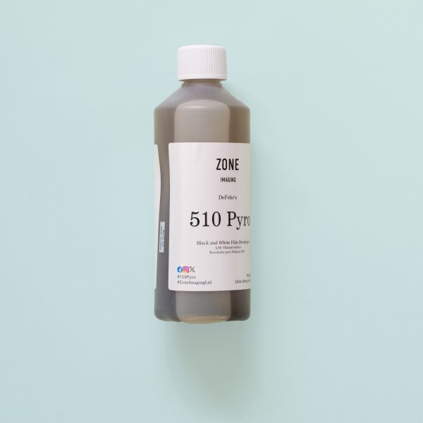 Bottle of Zone Imaging Pyro 510 Film developer on teal background