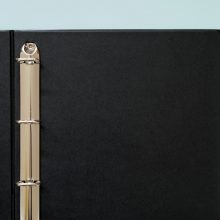 Kenro Negative Ringbinder open on a pink background