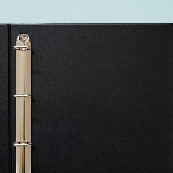 Kenro Negative Ringbinder open on a pink background