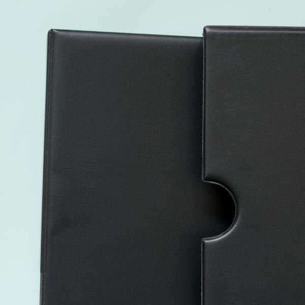 Kenro Negative Ringbinder and slipcase closed on a green background