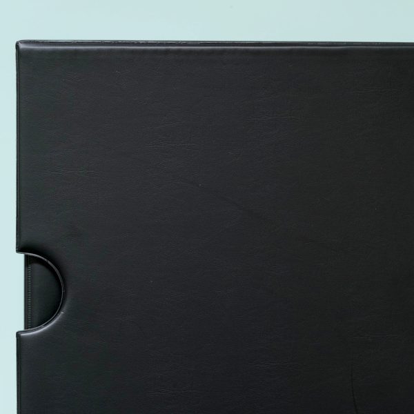 Kenro Negative Ringbinder and slipcase closed on a green background