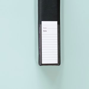 Kenro Negative Ringbinder spine on a green background