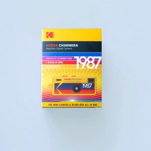 Kodak Charmera Digital Camera Keychain Box on a blue background