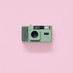 Long Weekend 35mm Film Camera Moss on a pink background