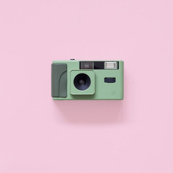 Long Weekend 35mm Film Camera Moss on a pink background