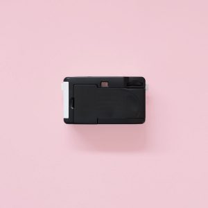 Kodak i60 35mm Film Camera Green back view on pink background