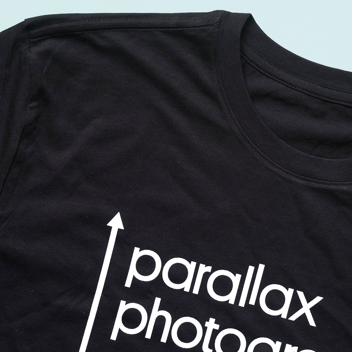 Parallax Photographic Coop T-Shirt Black 2 Parallax Photographic Coop T-shirt has our logo in white on a 100% organic black cotton shirt.