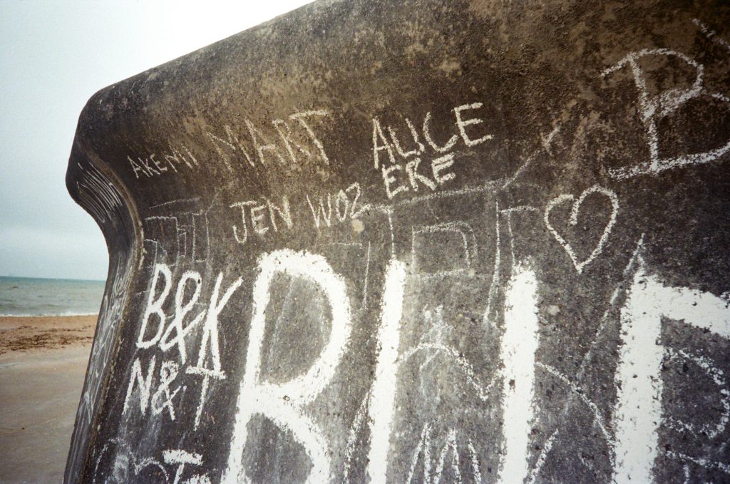 Chalk writing on wall Kent coast